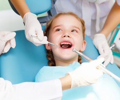 Little girl smiling at dentist check up